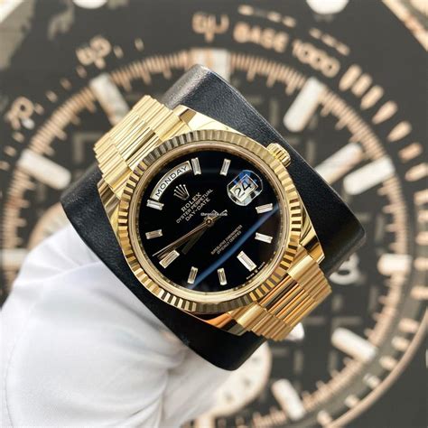 rolex day-date 40mm black dial|Rolex baguette diamond bezel.